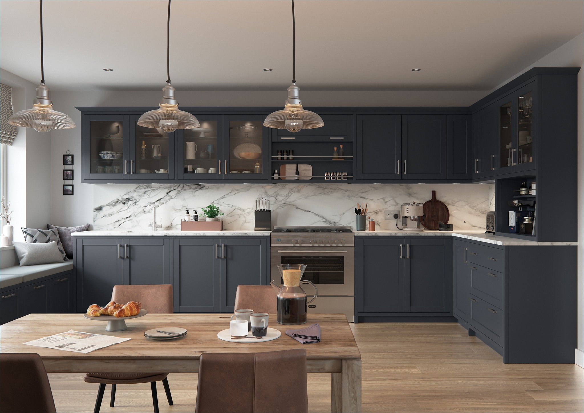 A bespoke fitted kitchen with marble worktops